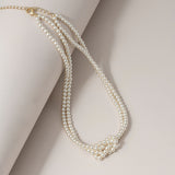 Knotted Pearl Necklace